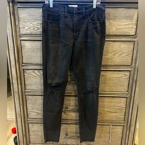 Soft black ripped knee skinnies